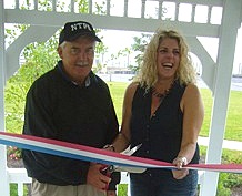 Neptune Mayor Eric Houghtaling and Environmental/Shade Tree Commission Member Mindi Arcoleo cut the ceremonial ribbon at a new gazebo in a refurbished park on S. Riverside Drive July 12.