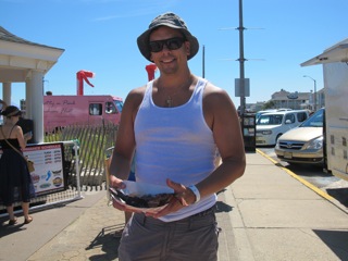 Bradley Beach resident Anthony Solimando gets ready to try some chocolate covered bacon. COASTER photo.