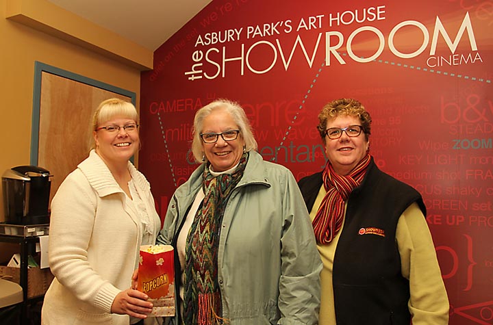 Ready for the movies at the Showroom in Asbury Park were (from left) Brett M. Drew and Lynne O’Neil, both of Ocean Grove with Debbie Boenig of the Showroom. - Coaster photo by Mike Kearns