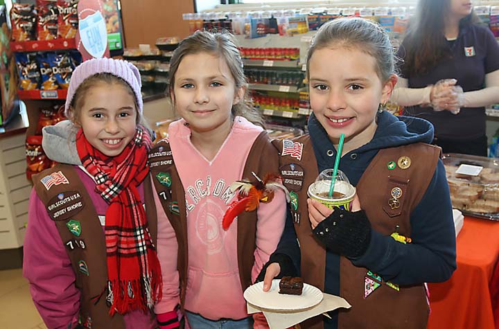 Girl scouts at the grand opening of the 7-Eleven convenience store in Neptune City were Quinn McGuigan, Rachel Hunter and Mia Petri.