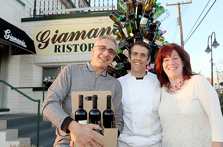 Chef Steffan Manno (center) is pictured with Michael and Kelly Minutillo, both of Freehold outside Manno’s restaurant, Giamano’s, in Bradley Beach. 