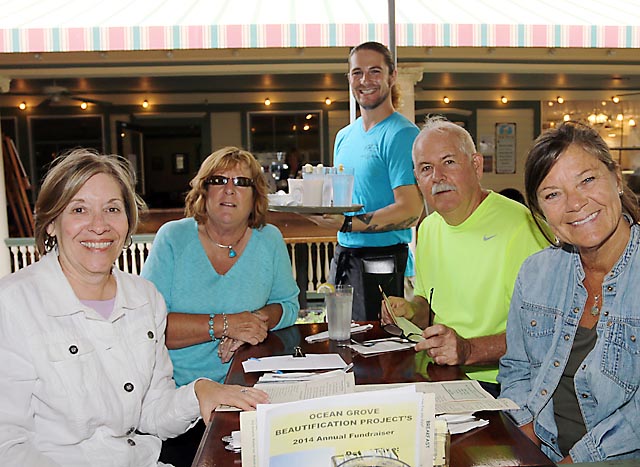 Bryan Vitalo, a server at the Starving Artist in Ocean Grove, waited on Jan Applegate, Asbury Park and Ocean Grove residents Connie Ogden, Greg Meyer and Colleen Meyer, all there supporting the Ocean Grove Beautification Project.
