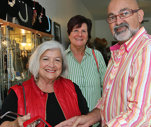 Malcolm Navias of Heaven Antiques and Art in Asbury Park is pictured with Valerie Gross amd Arlene Geist, both of Jackson Township.