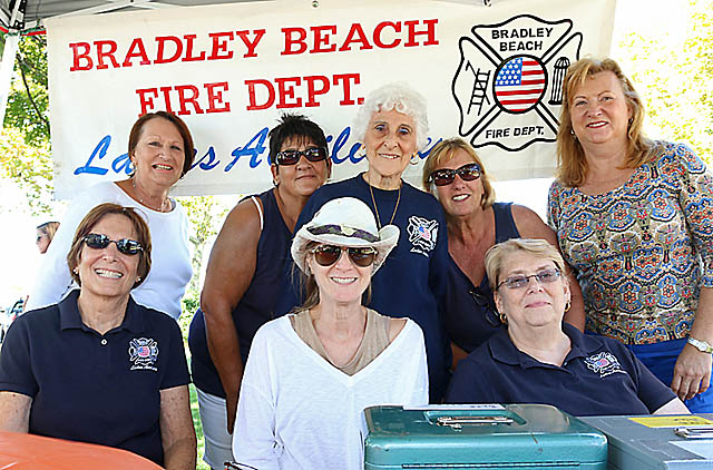 Helping out at the Bradley Beach Fire Department Ladies Auxiliary table at the festival Sat., Sept. 27 in Riley Park were (standing) Joan Wegrzyniak, Rose Crespo, Millie Domorski, Pam Cicerelli and Nanci Bachman. Seated were Judy Rubenstein, Beth Cotler and Kathie Christensen.