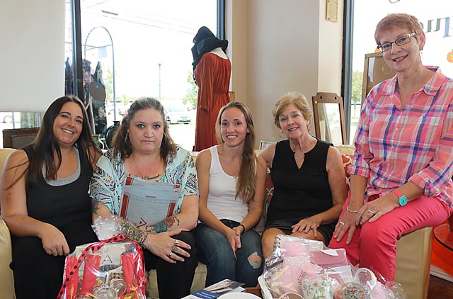 At the grand reopening of Second Chances gift shop in Neptune City were Theresa Ortenzio, Toms River; Marcel Delcorpo, business staff; Faith Petrowski, business staaff; Prudy White, Ocean Township and Jan Smith, Manasquan.