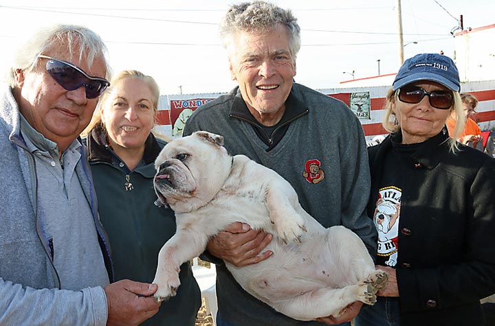 Attending the bulldog rescue event at the Wonder Bar in Asbury Park were Bob and Linda Beauchamp of Wanamassa with John Nerenberg of Wall Township holding Roxy and Kim Nerenberg.