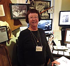 Coaster Photo - Former Oakhurst School student Mary Ann McKean, class of 1957, stands in front of a special exhibit at the Township of Ocean Historical Museum celebrating the school’s 114-year history.