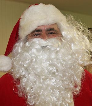 Chip ‘Santa’ Piancone, Wall - Ho, Ho, Ho, Ho, I’m Santa. I’ll be spending more. The kids always want more. Merry Christmas.