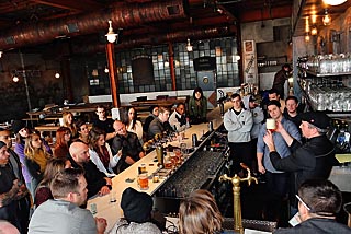 Brian Panzika of Pilsner Urguell (right) instructs the staff at Asbury Festhalle and Biergarten in Asbury Park on the proper way to serve beer. Coaster photo.