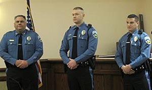 Coaster Photo - TF new PO: Chief John Scrivanic (far left) introduces new police officers Joseph Mauro and Jared Flynn at Tuesday's re-organization meeting.