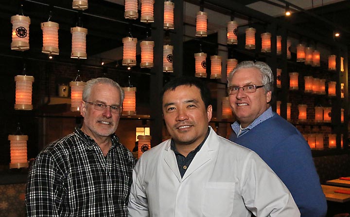 The new Taka restaurant opened to the public Jan. 29 at its new location on Cookman Avenue in Asbury Park. Pictured are owners Bill Kessler, Taka and David Martucci.
