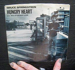 Coaster Photos - Annmarie Solimini Adderley (below), who divides her time between Bradley Beach and North Bergen, is the girl on the bike on the sleeve cover of Bruce Springsteen’s “Hungry Heart” single (pictured).