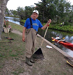 Bradley Beach resident Joe Licata got into his waders to help clean up Sylvan Lake.