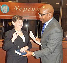 Coaster Photo - Neptune’s new Township Committeewoman Carol J. Rizzo was sworn in by Mayor Kevin McMillan at this week’s meeting.