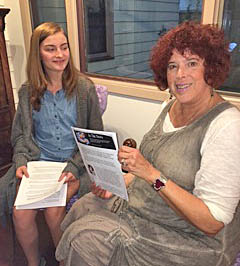 Dr. Barbara Holstein of West Allenhurst and Megan Brown review the script for a film.