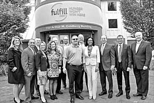 Coaster Photo - Local and county officials gathered Tues., May 23 for the unveiling of the new name for the Foodbank of Monmouth and Ocean Counties in Neptune. It will now be called Fulfill.