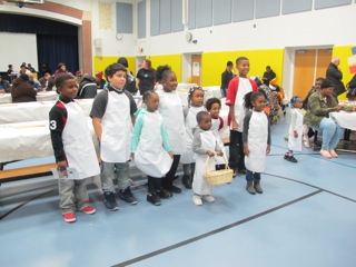 Coaster photo - Budding bakers were decked in their white aprons during the event.