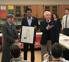 Sen. Vin Gopal presents William Folk, (left) with a Resolution from the State of NJ for his work as the Neptune City Board of Education Business Administrator for the last 25 years. Assemblyman Eric Houghtaling (right) also attended.